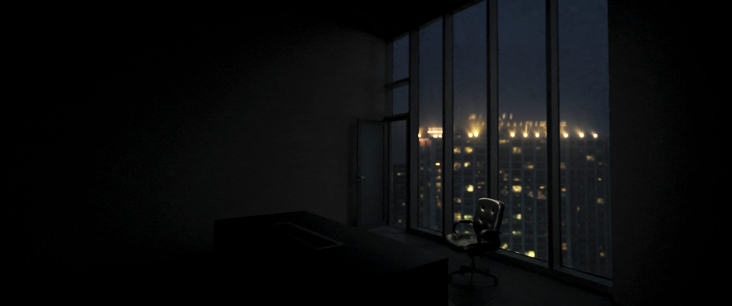 Jakarta skyline at dusk seen from a high-floor office